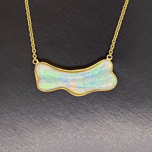 Crystal-opal-carving-gold-necklace